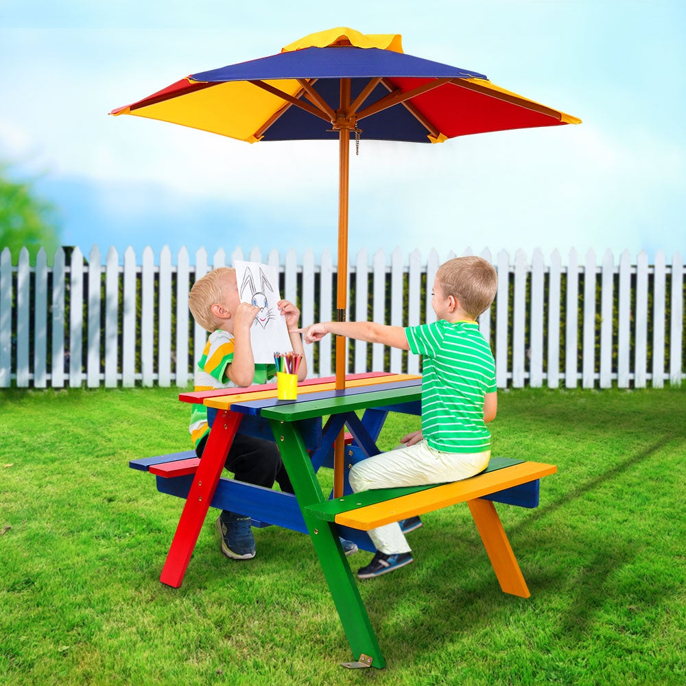 Keezi Kids Wooden Picnic Table Set featuring a colorful table, two benches, and a sturdy umbrella, perfect for outdoor play.